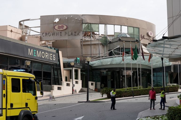 International nation flags fluter outside the damaged Crown Plaza hotel, following an Iranian military strike, in Manama International nation flags fluter outside the damaged Crown Plaza hotel, following an Iranian military strike, in Manama