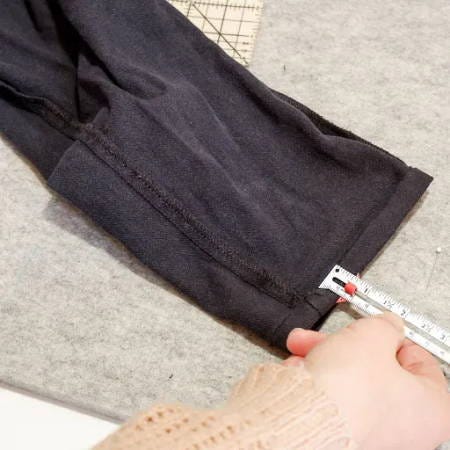 measuring and marking the folds for a double folded hem on pants