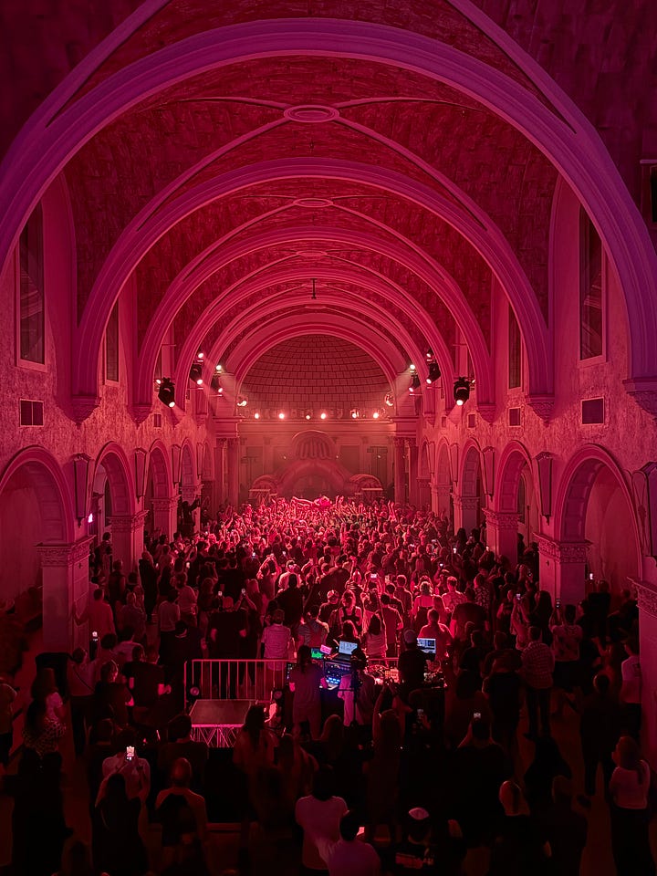 a crowd holding up a woman at La Rosa in Tucson