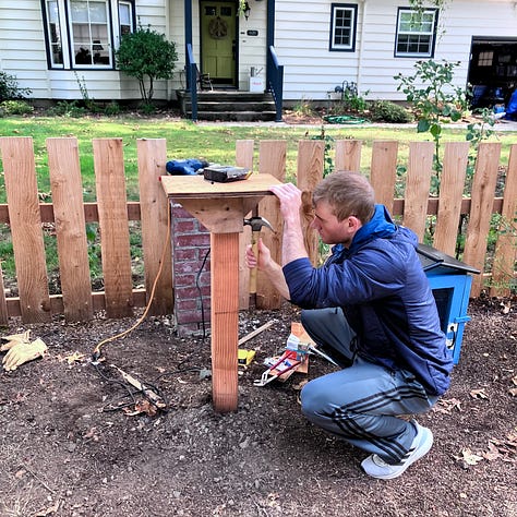 Steps to build a little library, digging a hole, pouring cement, sawing the wood, priming and painting, filling with books