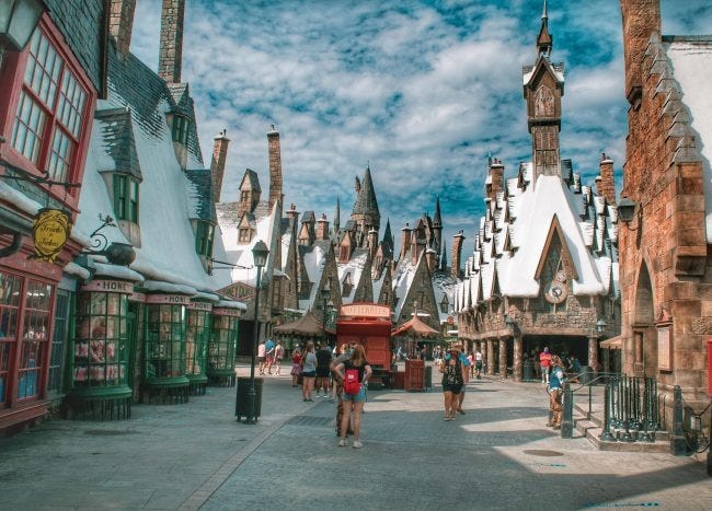 An American theme park version of a twee British town with bow-windowed shops and tilting chimneys