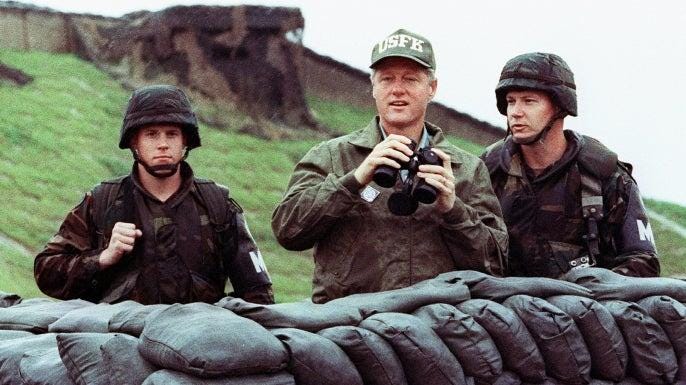 A group of men in military uniforms

Description automatically generated