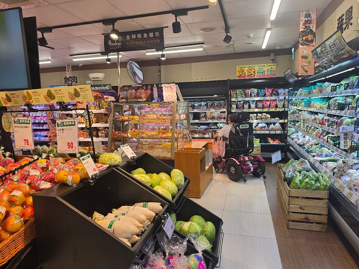 PX Mart in Taipe look at the lower shelves and larger font price tag and the ease of going around with a automated car