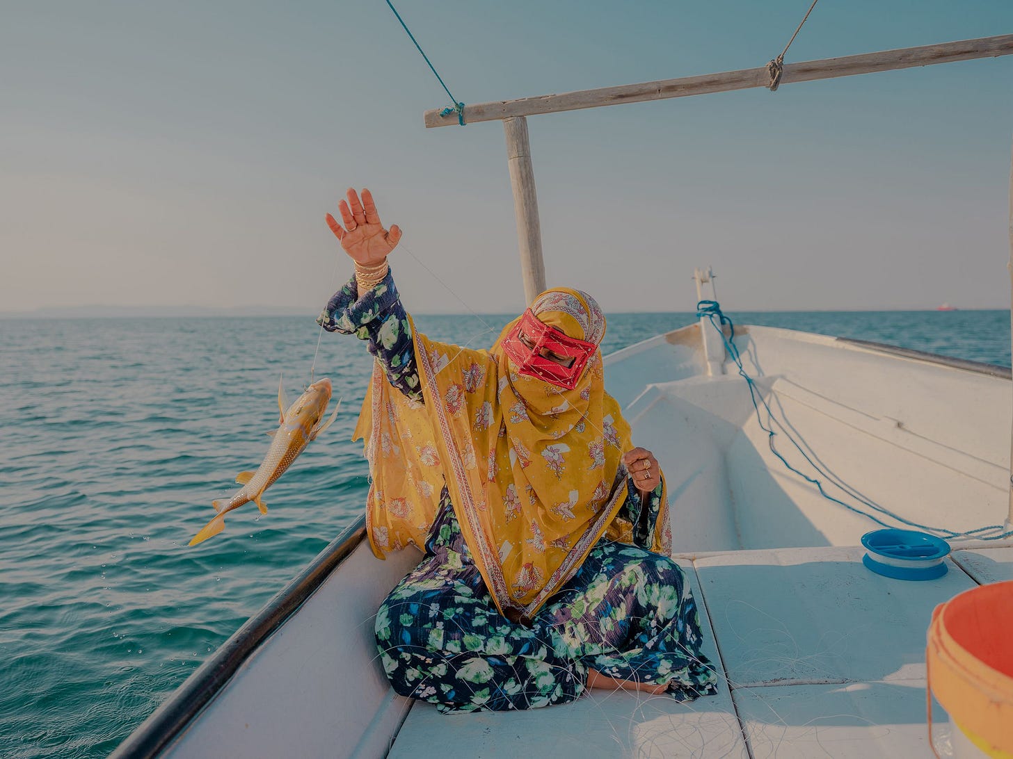 A woman fishing.