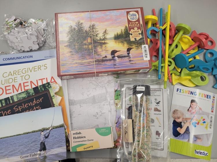 Items found in one of the kits include a puzzle, games, and resources.