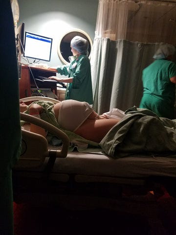 Aubrey on operating table for cesarean 