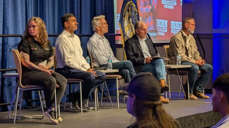 From left: Rachael Nelson, former chair of the Nebraska Libertarian Party; U.S. Rep. Ro Khanna (D-Calif.); former U.S. Rep. Joe Walsh (R-Ill.); former Republican National Committee Chair Marc Racicot; and Dan Osborn, an independent candidate for U.S. Senate in Nebraska, at a “cross-party” town hall in Omaha, Neb., on Saturday, Oct. 24. Photo: Chase Porter/Courier Nebraska.