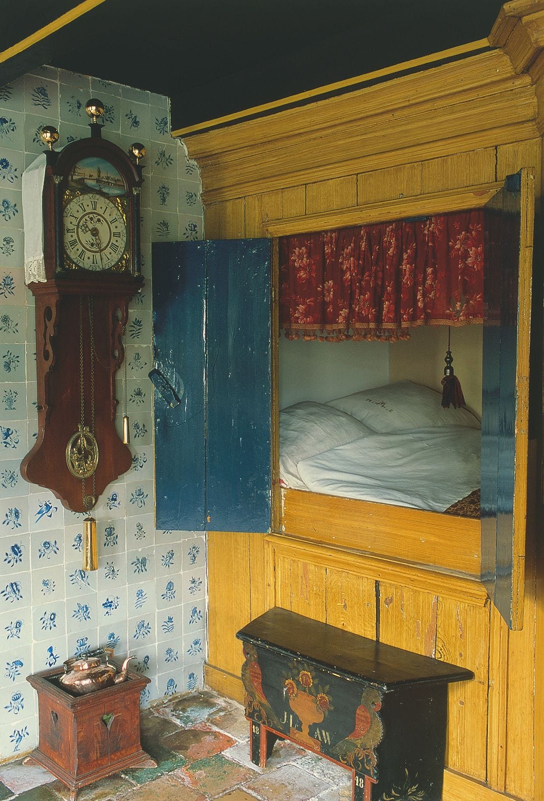 Image may contain Furniture Bed Bedroom Indoors Room and Bench