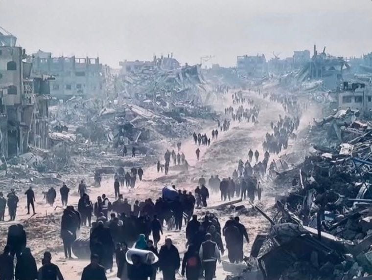 Palestinians returning to the location of their homes, walk in long lines down dusty tracks that wind through the ruins of Gaza.