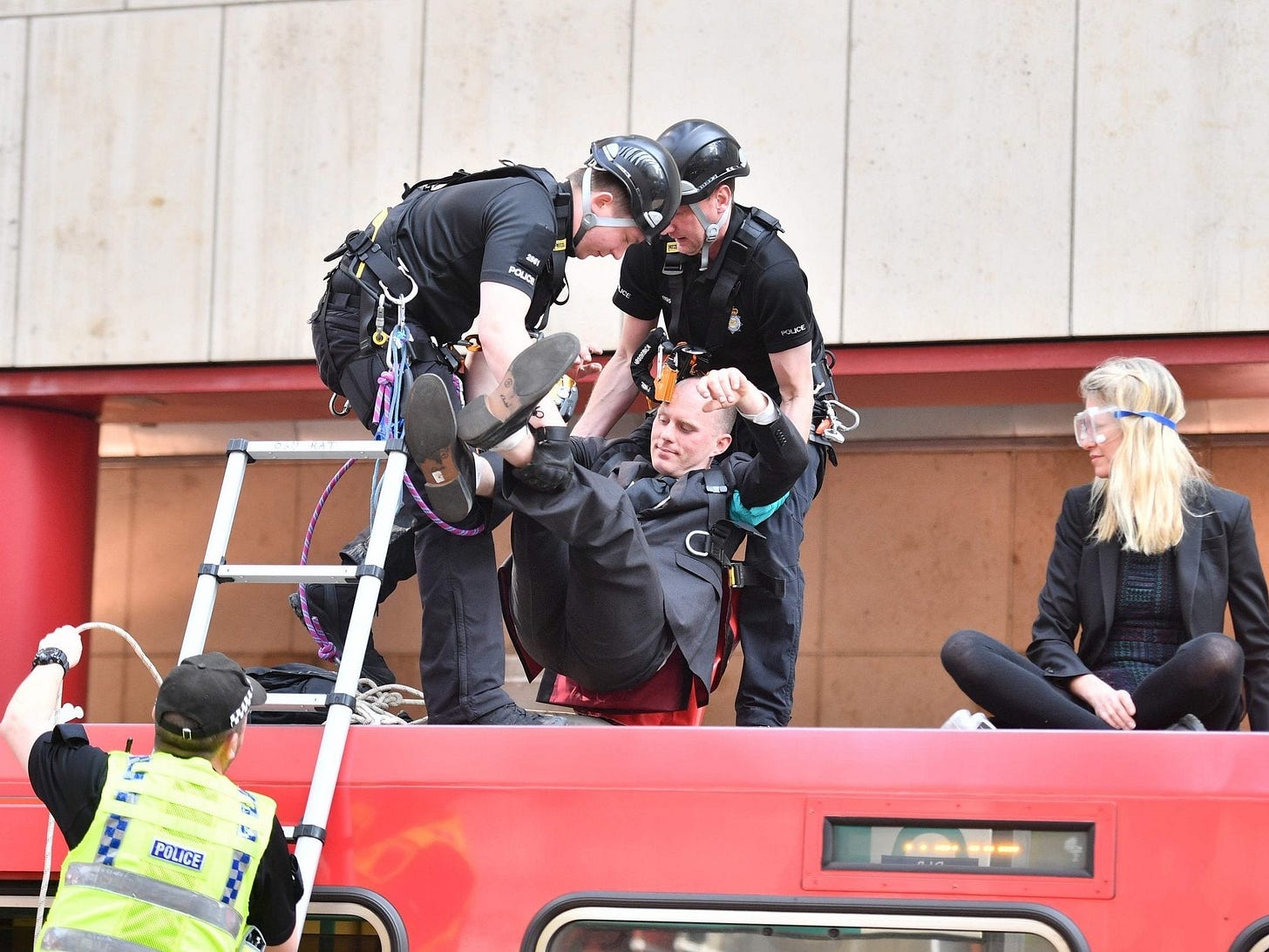 Extinction Rebellion activists who glued themselves to trains spared jail as judge notes 'noble' cause | The Independent | The Independent Extinction Rebellion activists who glued themselves to trains spared jail as judge notes 'noble' cause | The Independent | The Independent