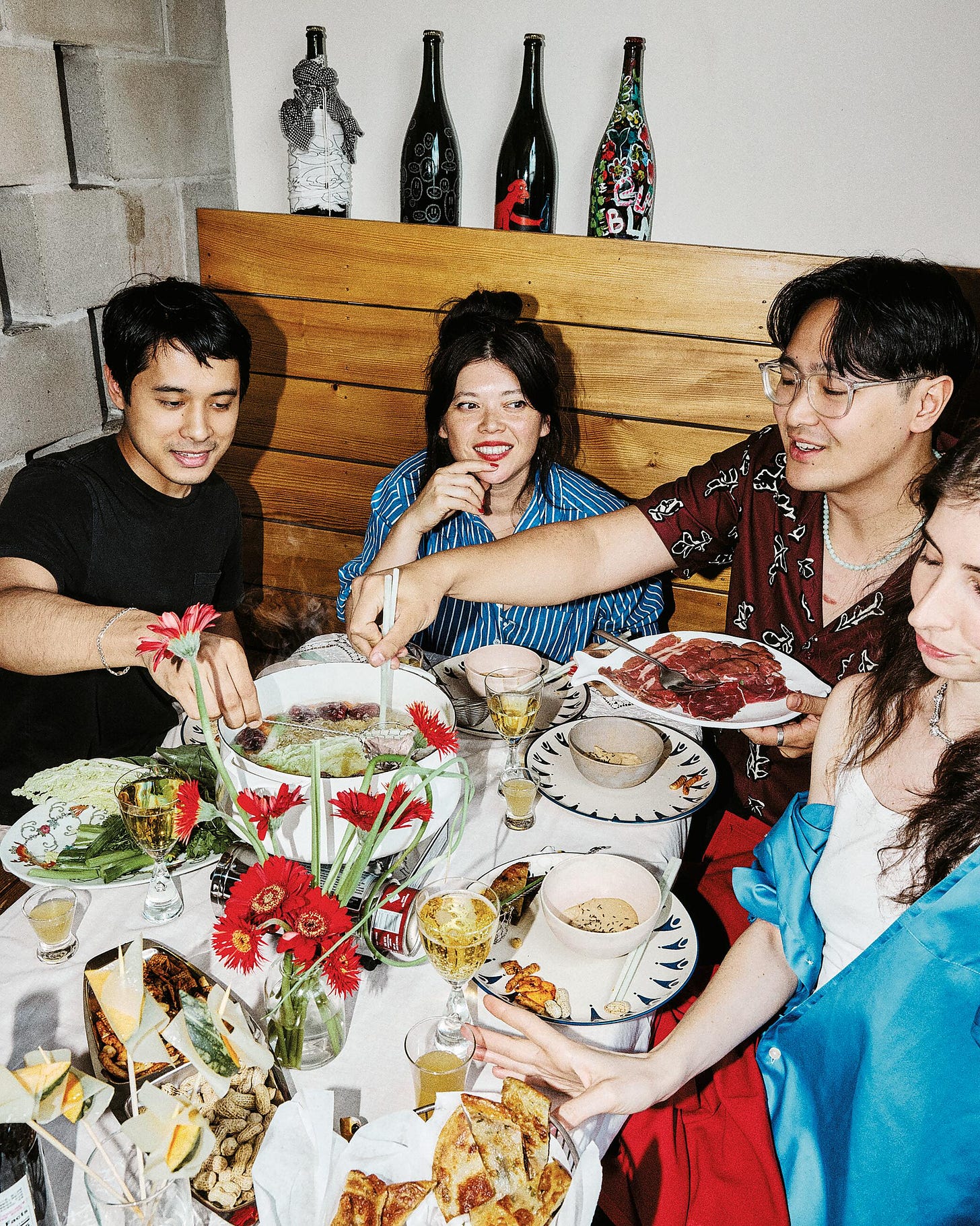Natasha and friends at the table with hot pot.