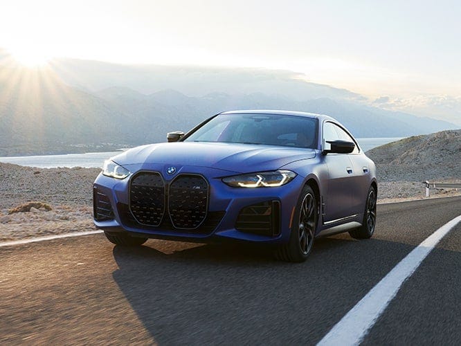 A 2022 BMW i4 M50 Gran Coupe shows off the stylish available Shadowline Package