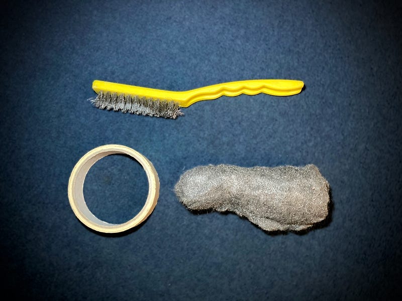 Wire brush, masking tape, and wire wool. 
