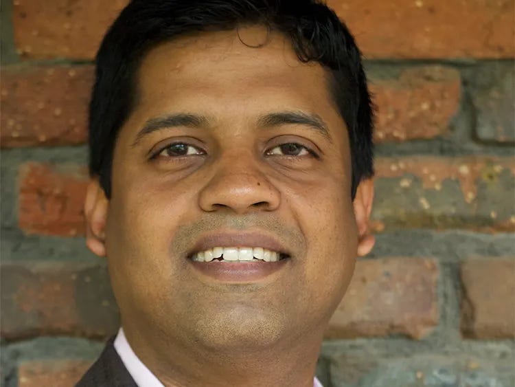 Portrait of Sriram Lakshminarayanan, IPERS chief investment officer, standing in front of a brick wall. Portrait of Sriram Lakshminarayanan, IPERS chief investment officer, standing in front of a brick wall.