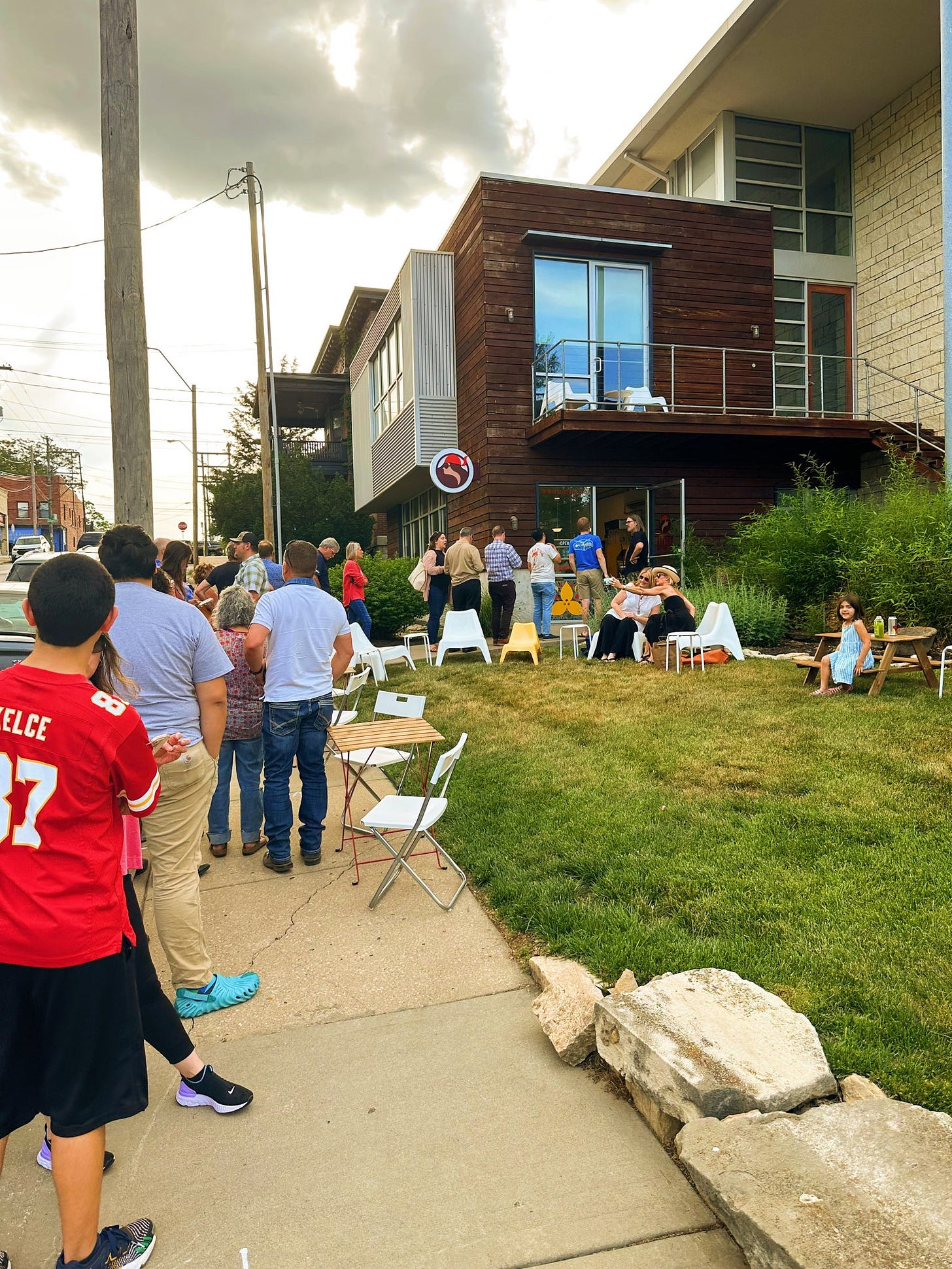 A line of guests waiting for tacos. 