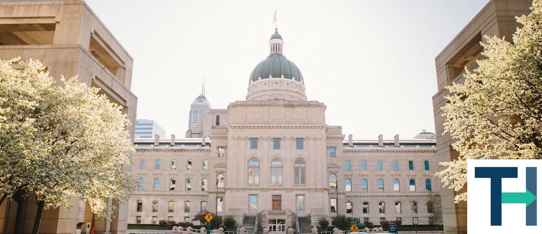 white sedan parked near white concrete building during daytime white sedan parked near white concrete building during daytime