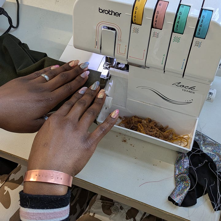 a person clipping a bag pattern together, a person sewing on a serger