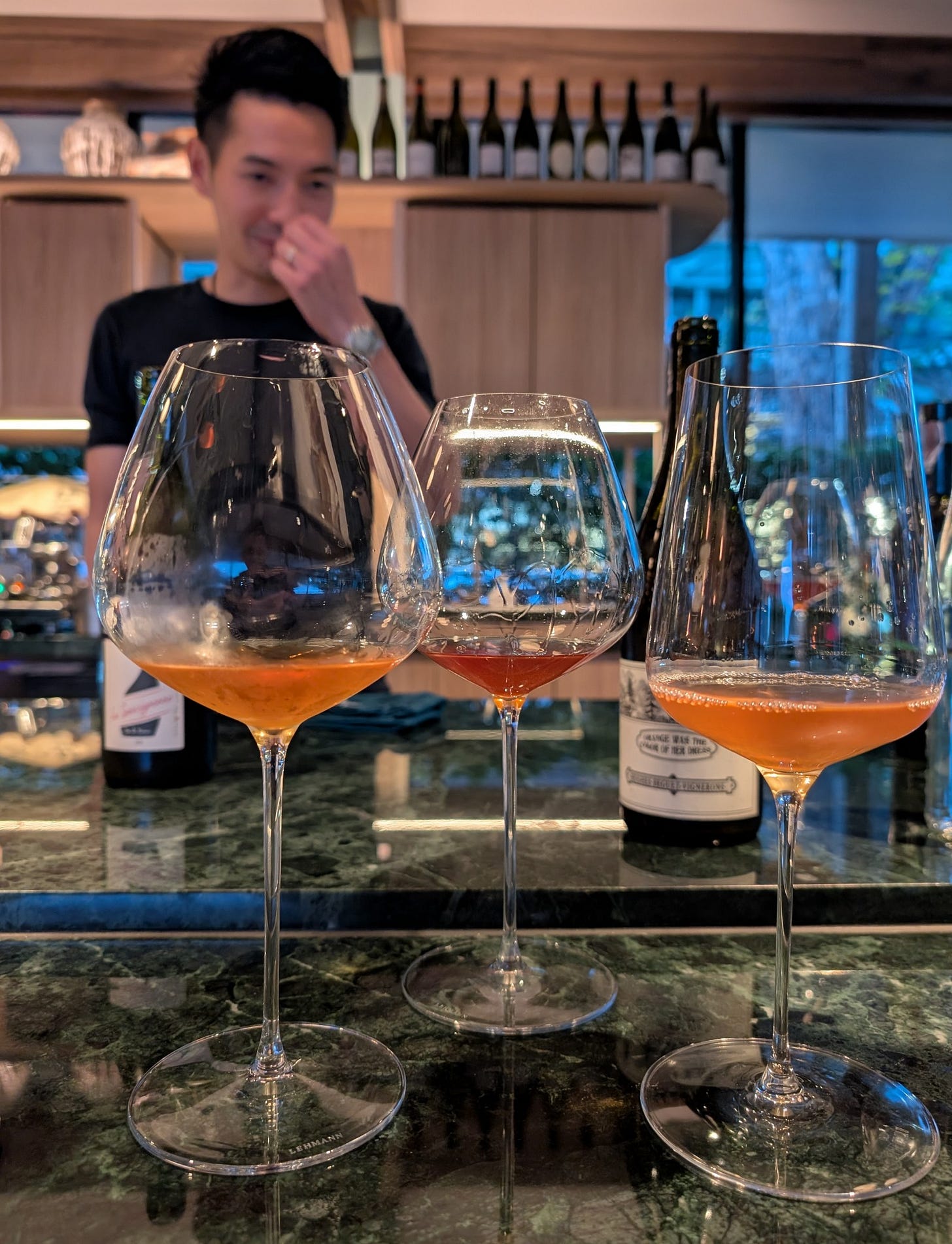 Shwin Tangcravakoon serving orange wines at Bistro Verlan Shwin Tangcravakoon serving orange wines at Bistro Verlan