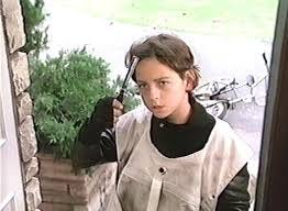 screen shot of kid demanding his two dollars for his paper route from Better Off Dead