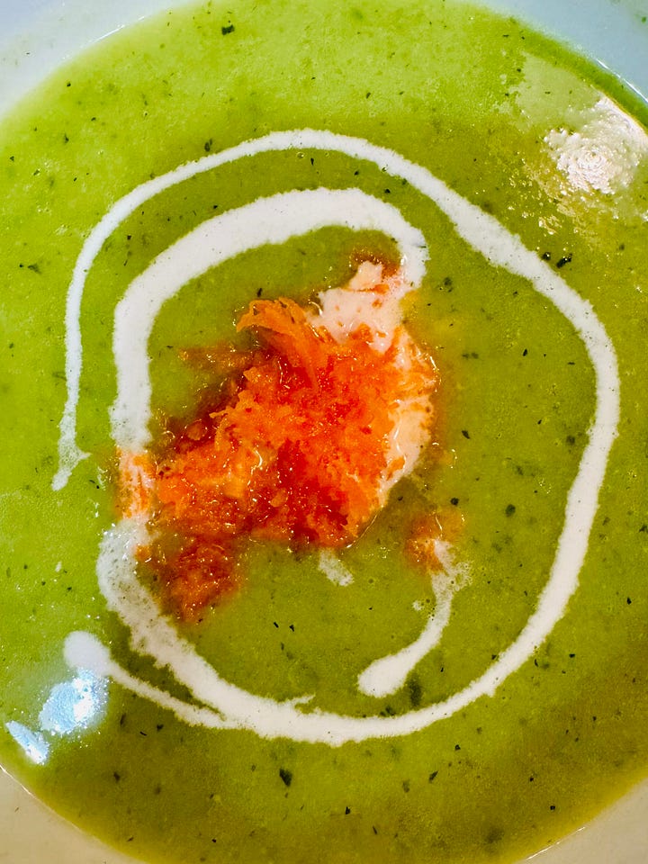 Patriot soup cooking in a stockpot; finished soup with cream and shredded carrots.