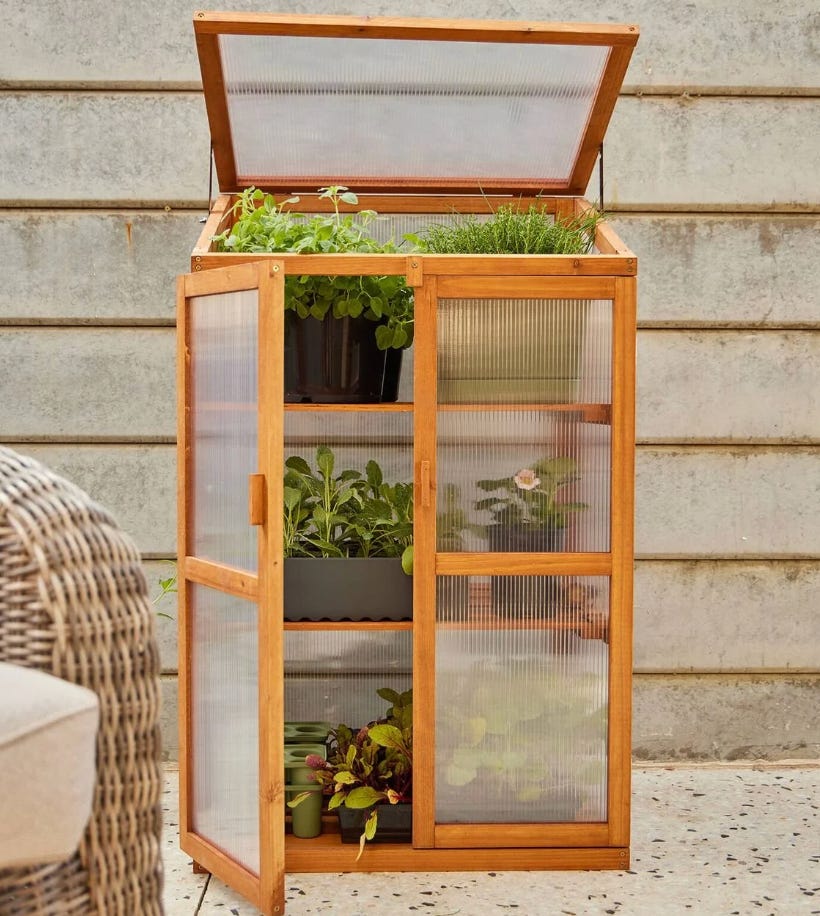 Timber locker filled with plants.