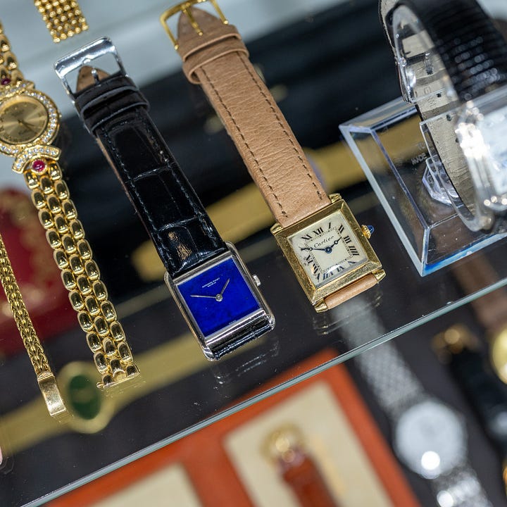 A collection of vintage stone dial watches.