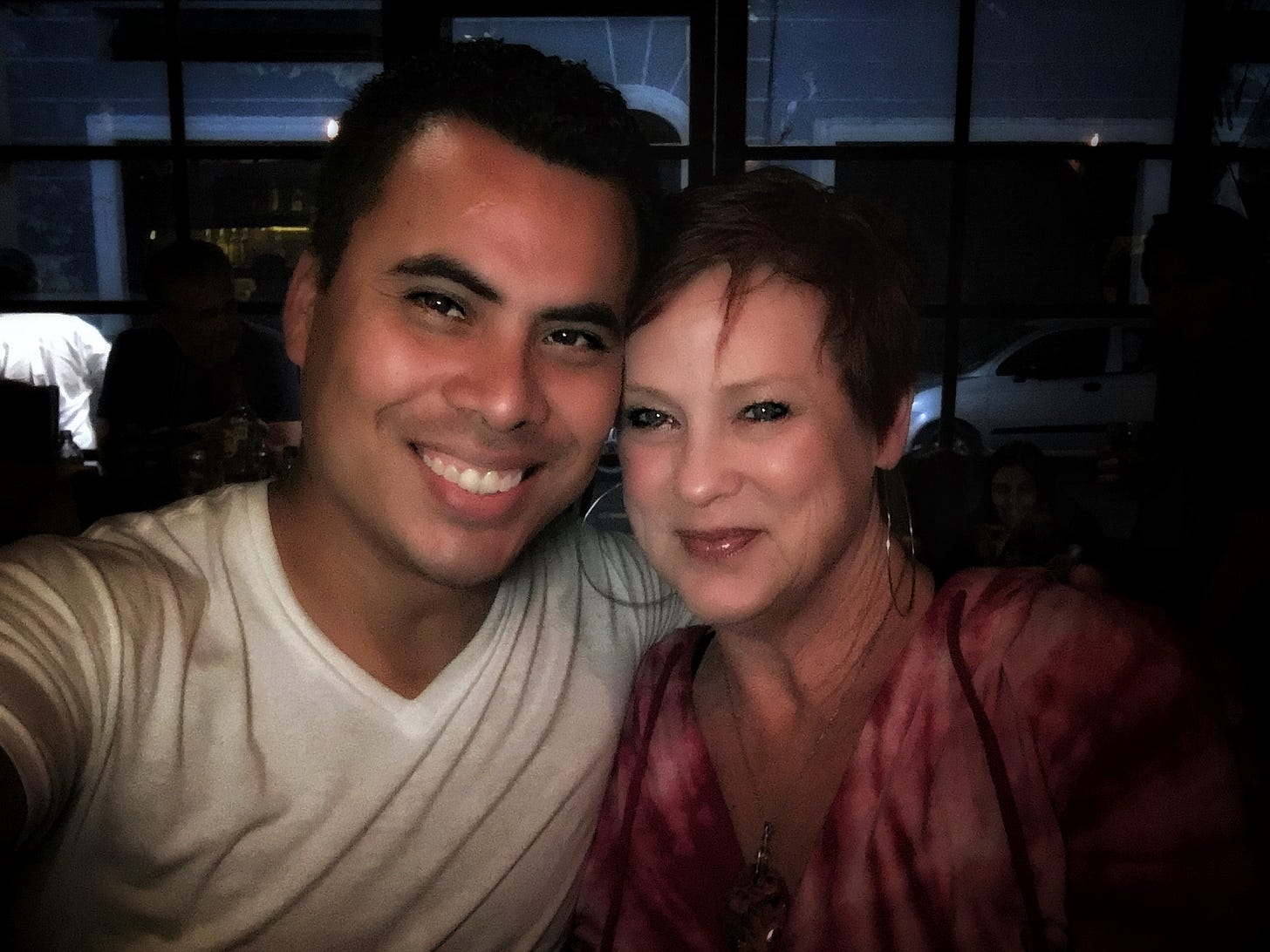 Angel Rodríguez and Amy Jones smiling in a selfie at Murciégalo