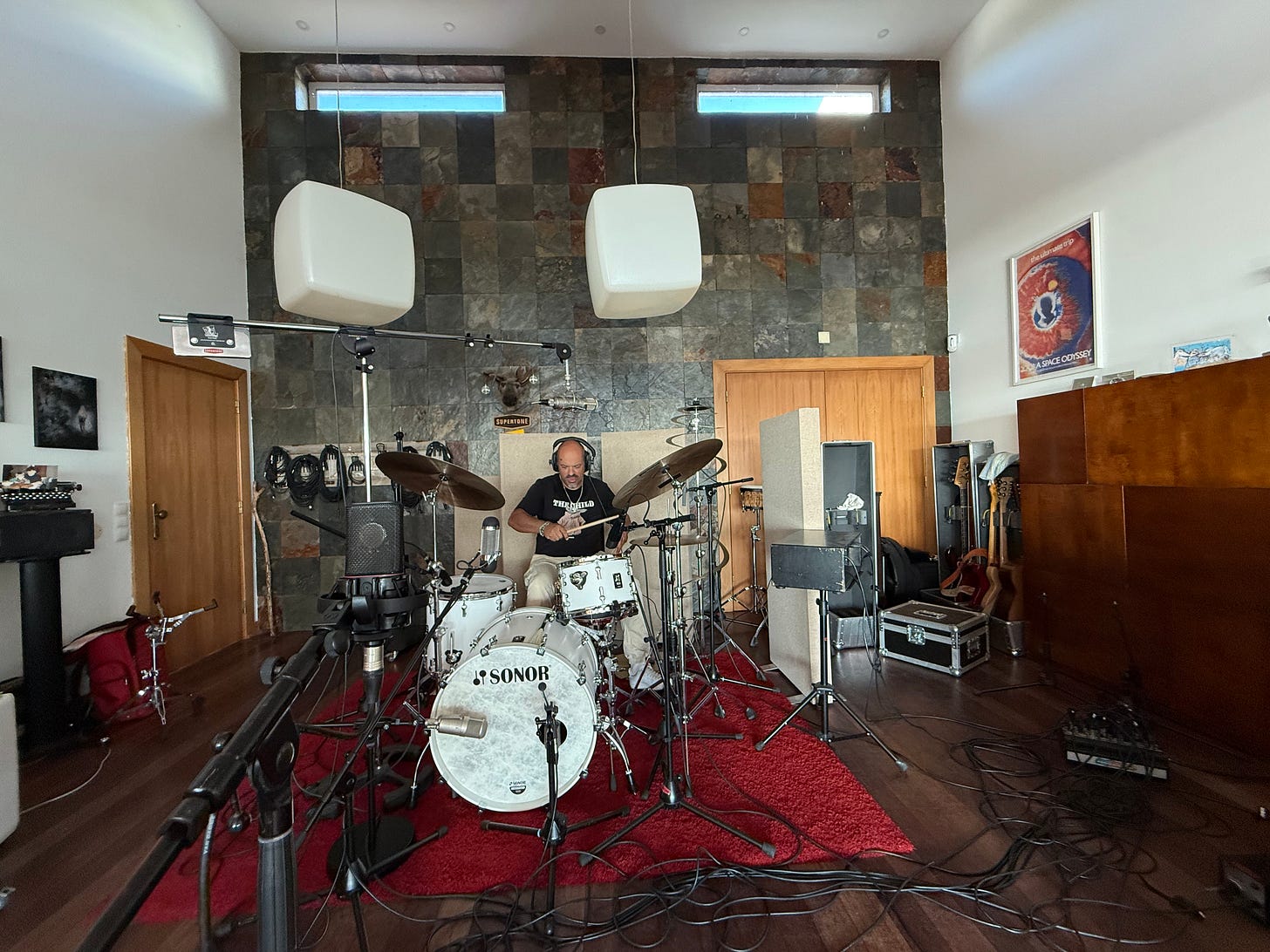 Man recording playing drums Man recording playing drums