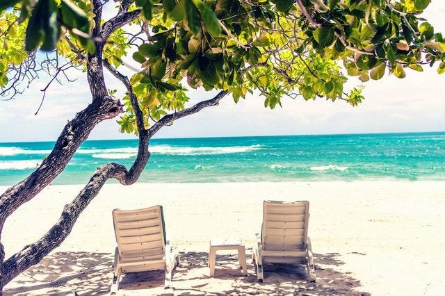 Top destinations in the Caribean Loungers on a beach in the Caribbean