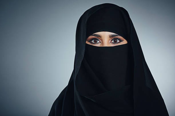 It's all in the eyes Studio portrait of a young muslim businesswoman against a grey background woman in burka stock pictures, royalty-free photos & images