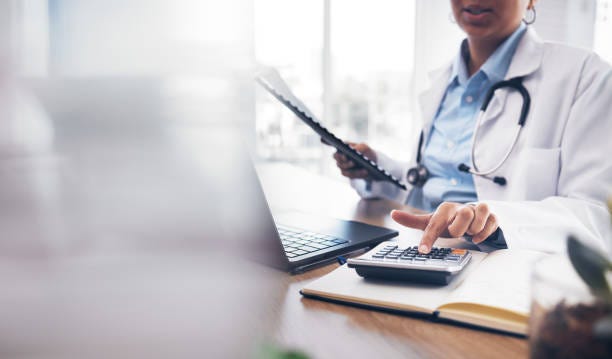 Accounting doctor, calculator and hands of person calculating bookkeeping finance, hospital budget or medical savings. Mockup space, healthcare and accountant working on taxes, audit or compliance Accounting doctor, calculator and hands of person calculating bookkeeping finance, hospital budget or medical savings. Mockup space, healthcare and accountant working on taxes, audit or compliance cpa for doctors stock pictures, royalty-free photos & images