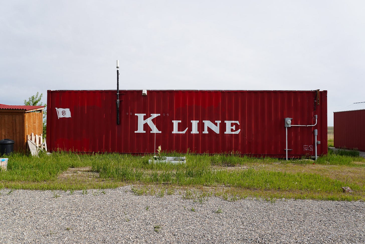 Photo of a 40 foot high cube shipping container, the surface to be decorated with a mural.