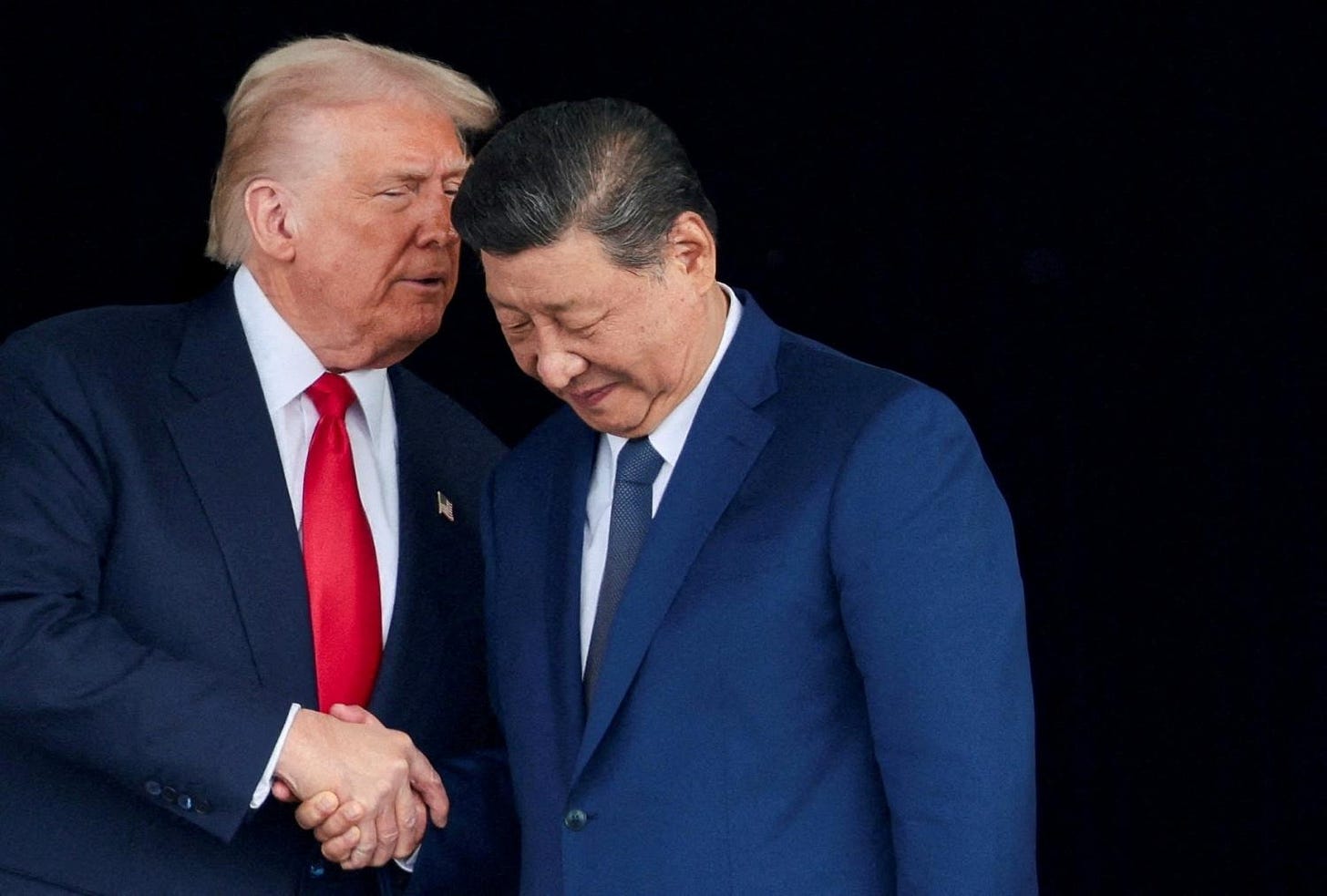 U.S. President Donald Trump and Chinese President Xi Jinping talk as they leave after a bilateral meeting at Gimhae International Airport, on the sidelines of the Asia-Pacific Economic Cooperation (APEC) summit, in Busan, South Korea, October 30, 2025. U.S. President Donald Trump and Chinese President Xi Jinping talk as they leave after a bilateral meeting at Gimhae International Airport, on the sidelines of the Asia-Pacific Economic Cooperation (APEC) summit, in Busan, South Korea, October 30, 2025.