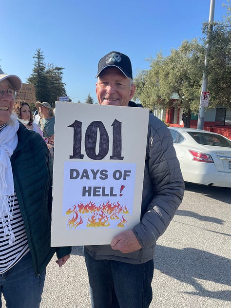 Protestors holding signs