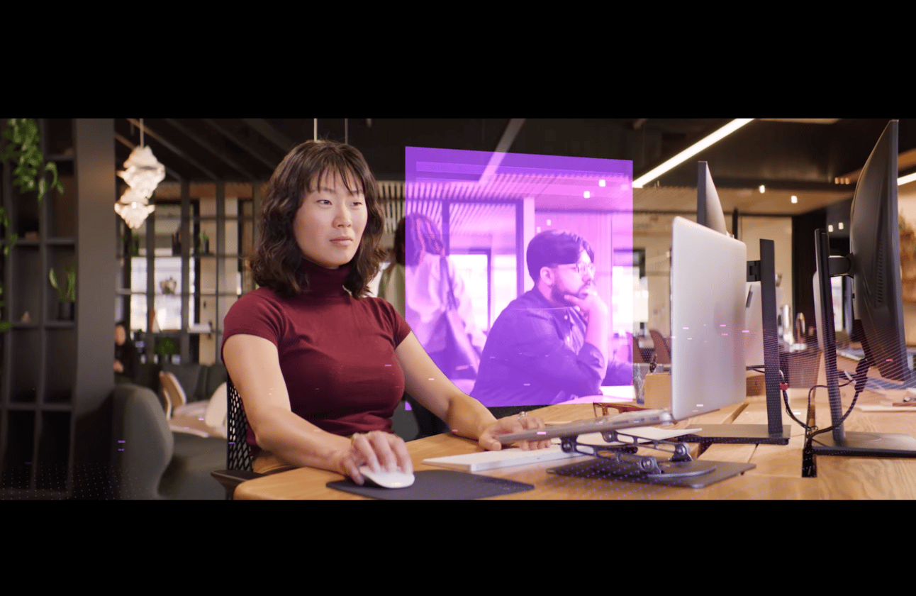 an asian woman at a computer screen an asian woman at a computer screen