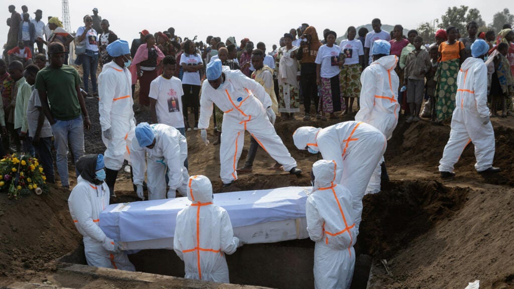 Civil society workers participate in a burial of civilians killed during the clashes between M23 rebels and the Armed Forces of the Democratic Republic of the Congo, at the Genocost cemetery, in Goma, North Kivu, on 2 September 2024. 