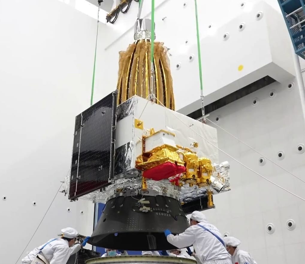 Queqiao-2 being placed on a payload mount prior to encapsulation in the Long March 8's fairing. Queqiao-2 being placed on a payload mount prior to encapsulation in the Long March 8's fairing.