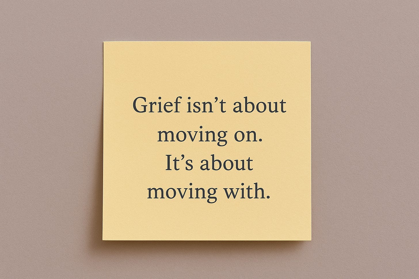 Minimal yellow sticky note on a soft beige background with gentle lighting.