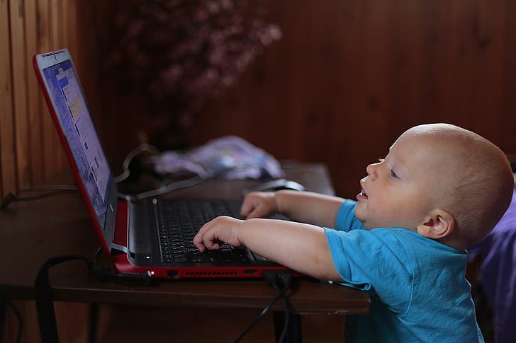 Royalty-Free photo: Toddler wearing blue shirt using laptop computer |  PickPik Royalty-Free photo: Toddler wearing blue shirt using laptop computer |  PickPik