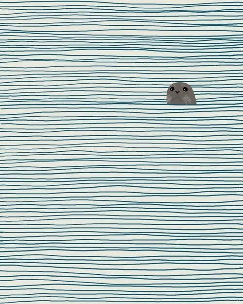 This may contain: an animal floating in the water with waves