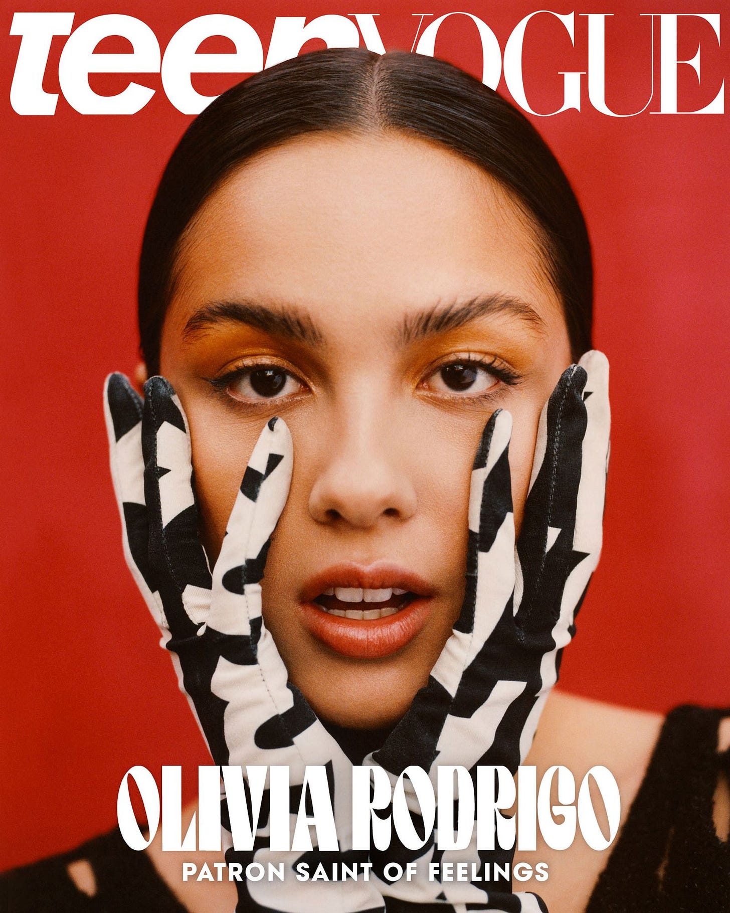 Image may contain Human Person Face and Magazine
