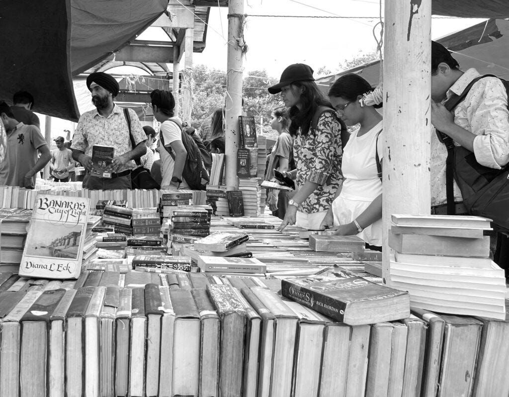 sunday book market - people looking at books sunday book market - people looking at books