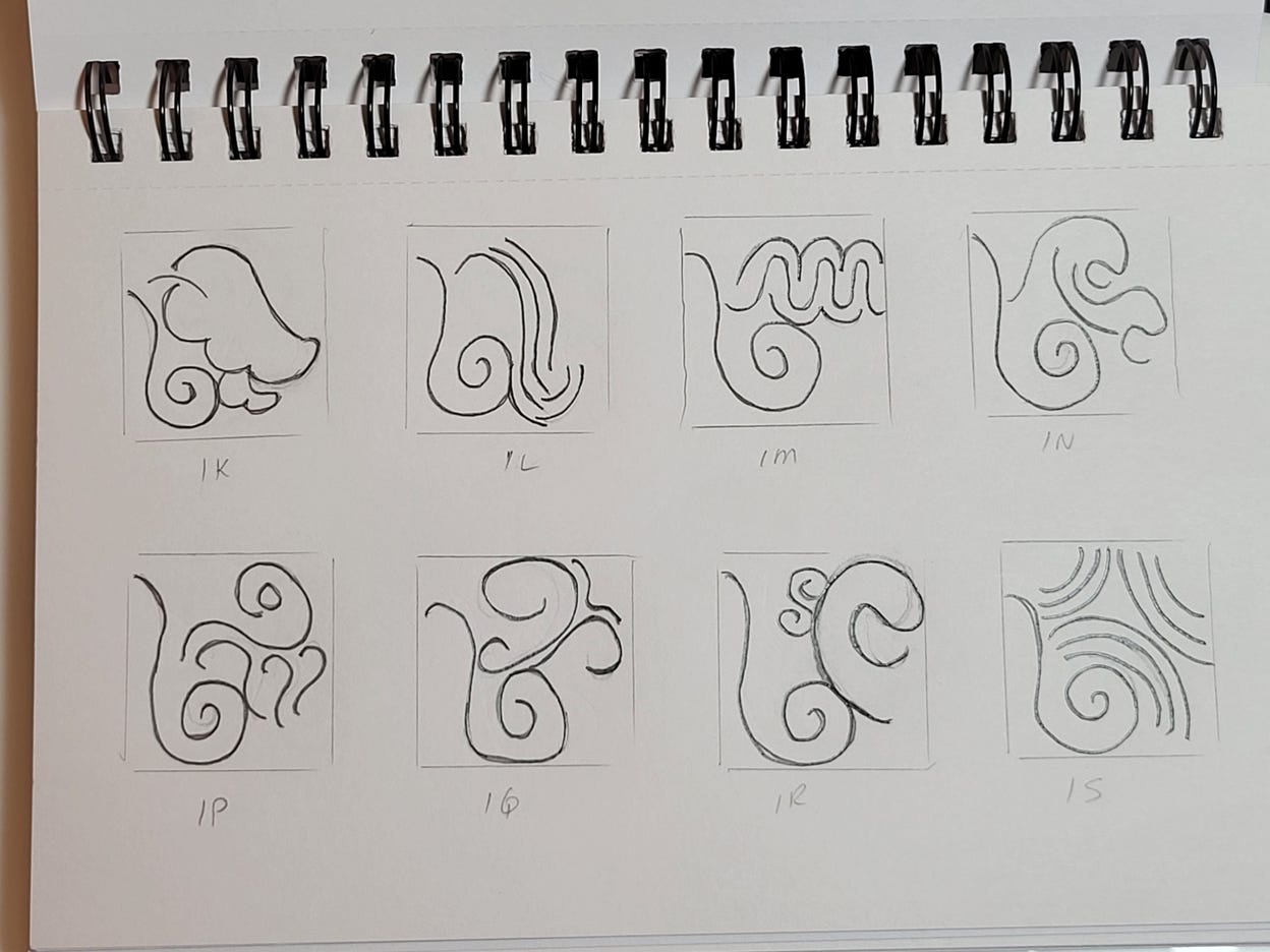 A spiral bound sketchbook with alien glyph designs in boxes to create a uniform scale.
