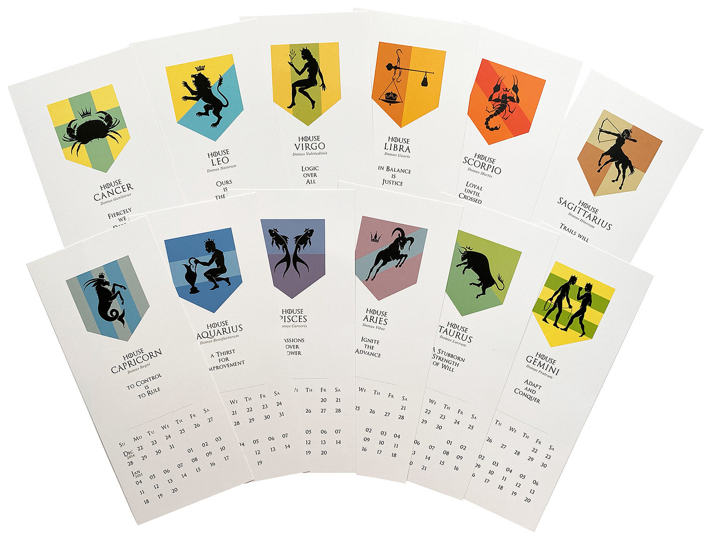 set of calendar month cards featuring each zodiac sign as a coat of arms or sigil