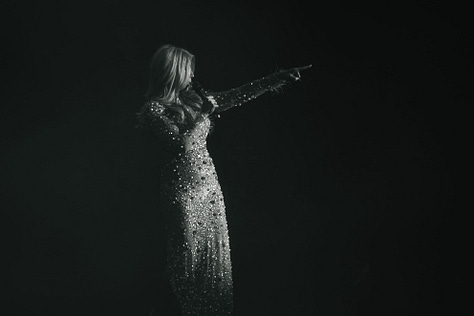 images of burlesque performers on stage with artistic lighting