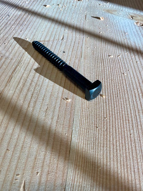 A lag bold, mounting blacket and the swing-away seat.