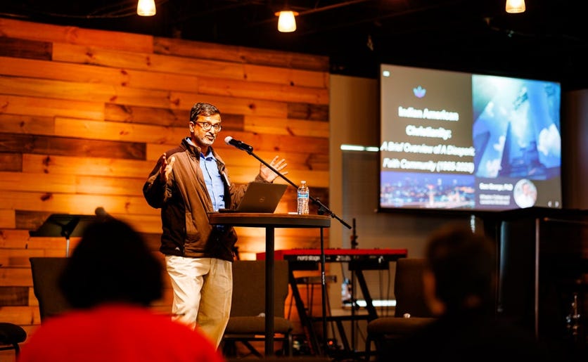 Male conference speaker on stage