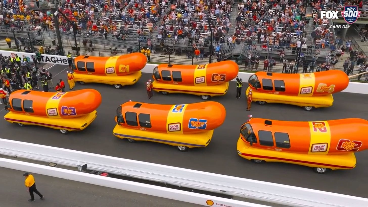 6 Wienermobiles on the track 6 Wienermobiles on the track