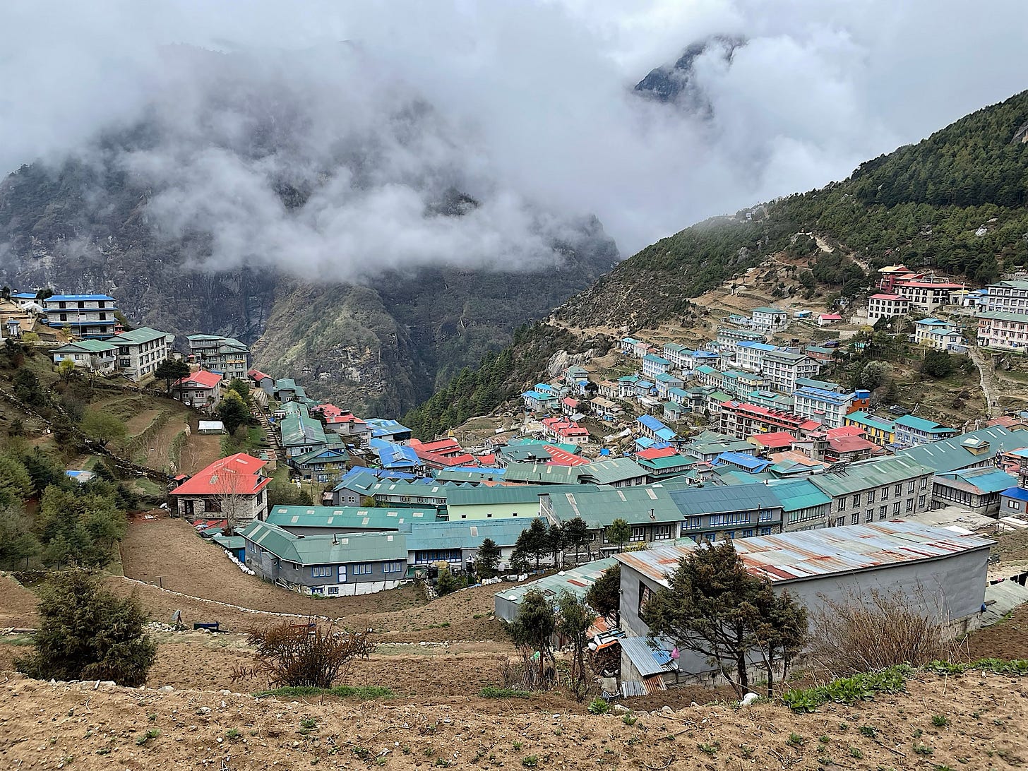 Our last view of Namche, nestled in the clouds this morning.