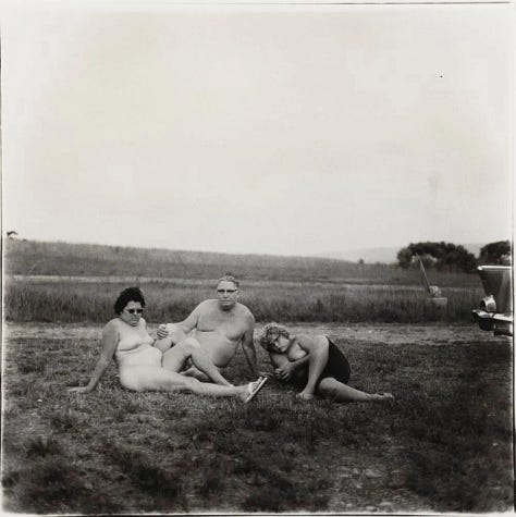 Black and white photographs of people including Susan Sontag and Norman Mailer